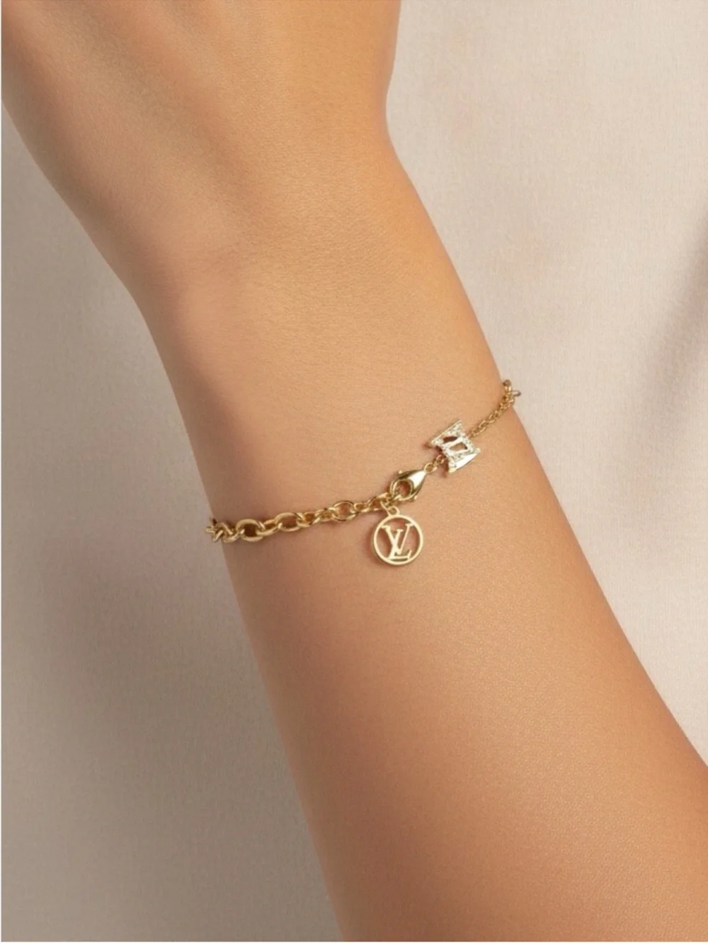 Louis Vuitton Gold LV Charm Chain Bracelet COA Included